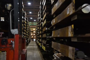 Sullivan Steel warehouse aisle with yellow pans