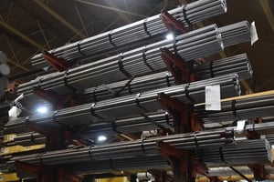 Stainless steel bar bundles on Sullivan Steel's warehouse racks