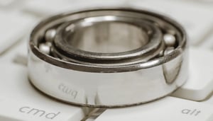 Up-close image of a stainless-steel ball bearing.