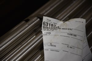Zoomed in photo of a tag on an XD16N steel bundle from Sullivan Steel.